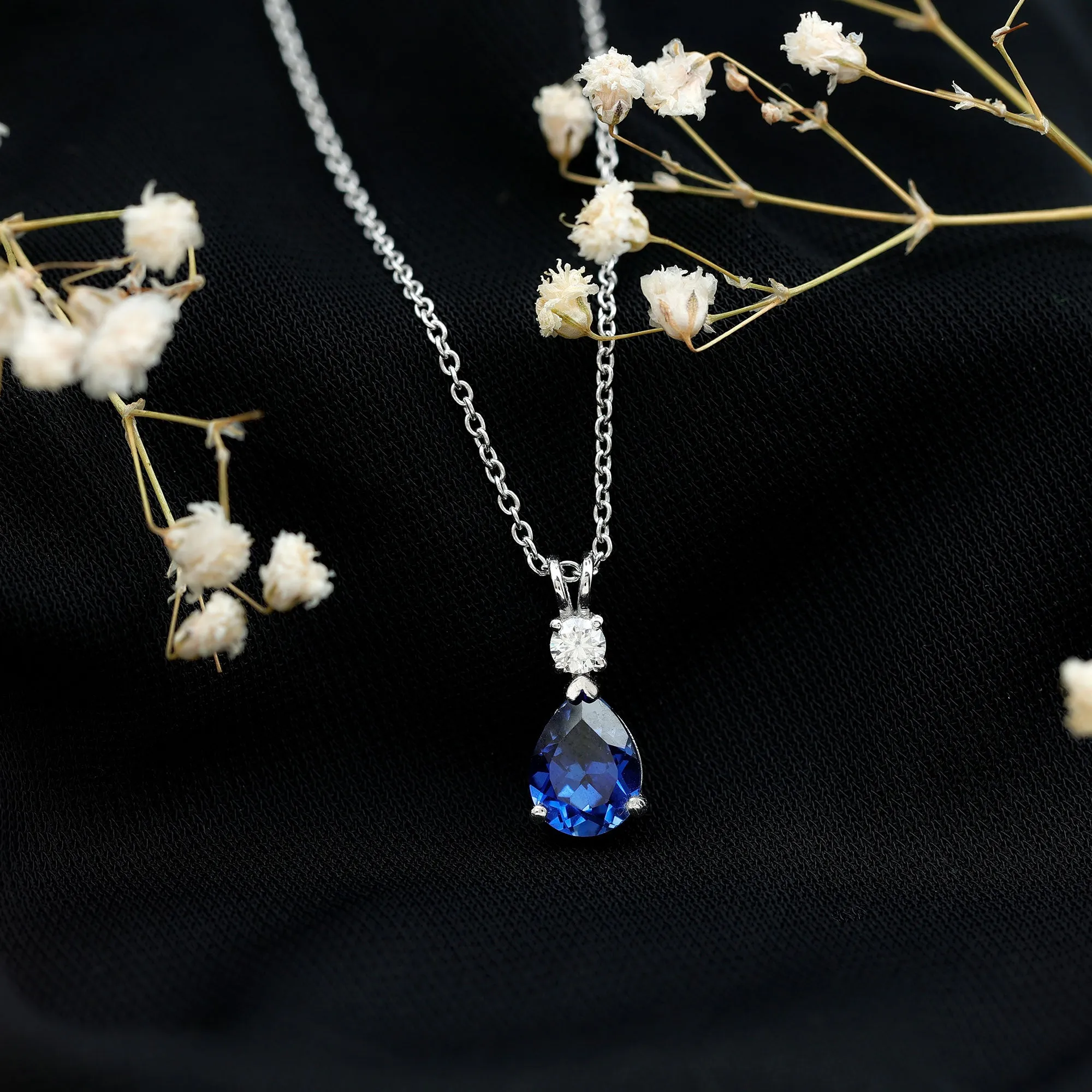 Created Blue Sapphire and Moissanite Modern Teardrop Pendant
