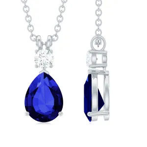 Created Blue Sapphire and Moissanite Modern Teardrop Pendant