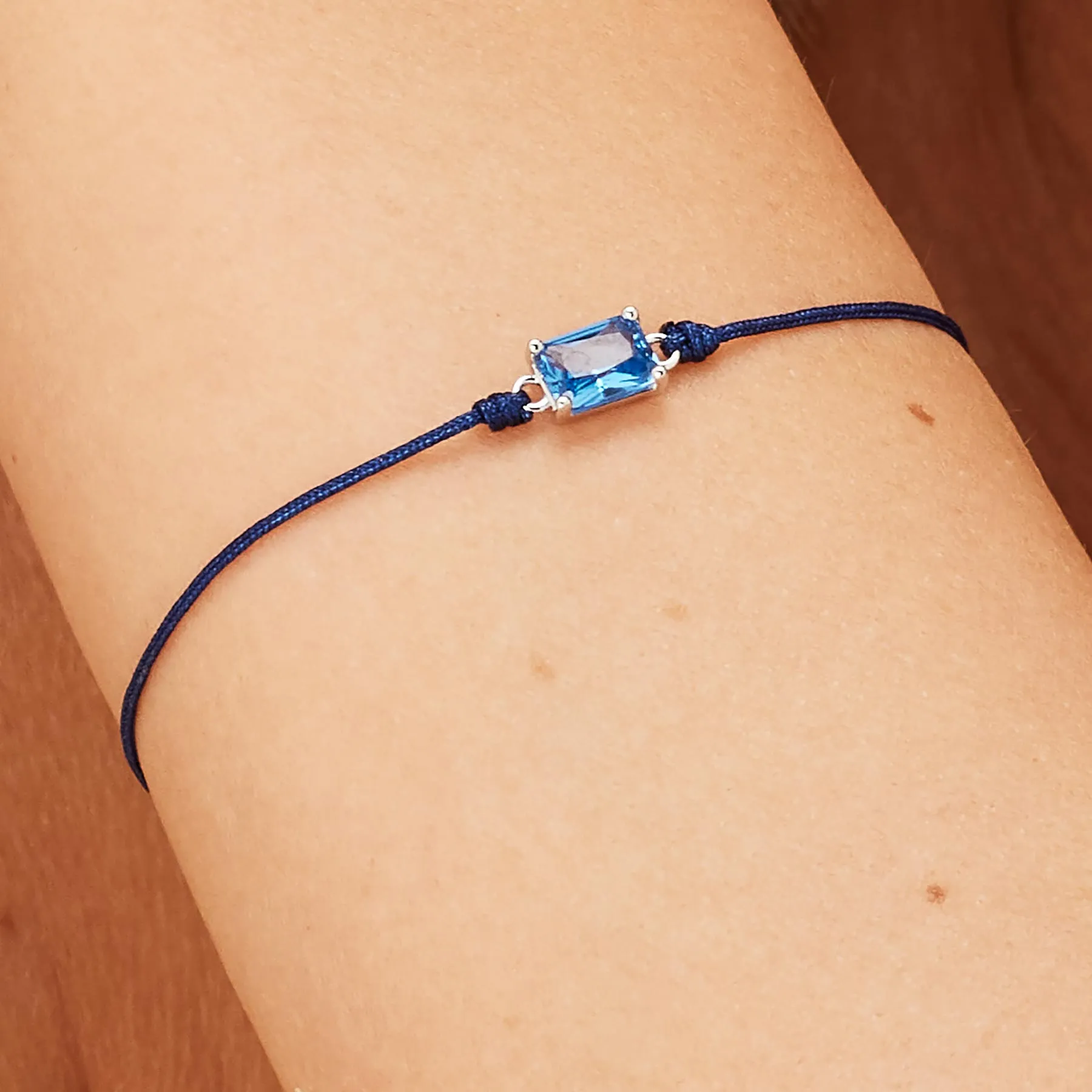 Fancy Blue Stone Cord Bracelet in Sterling Silver