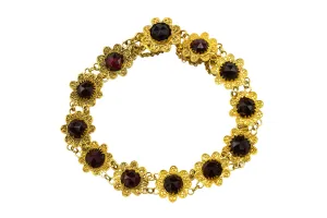 Garnet bracelet in 14 carat gold