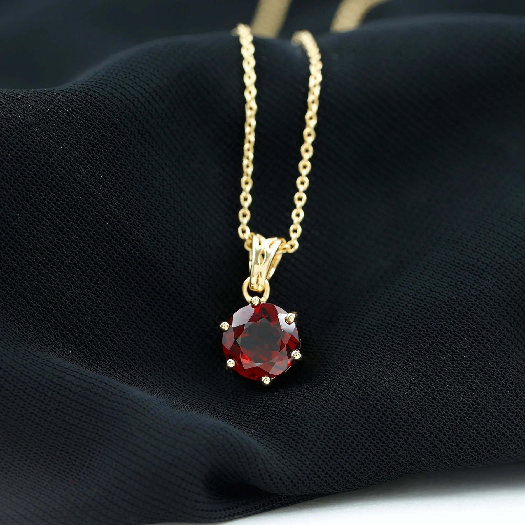 Six Prong Set Round Garnet Solitaire Pendant with Decorative Bail