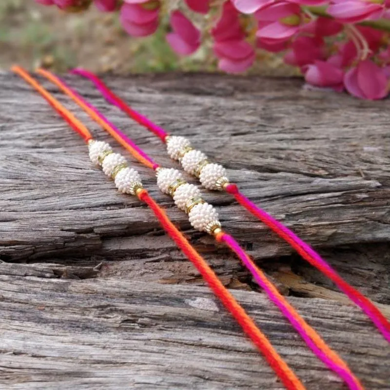 Suave Handcrafted White Beaded Rakhi (Set of 3)